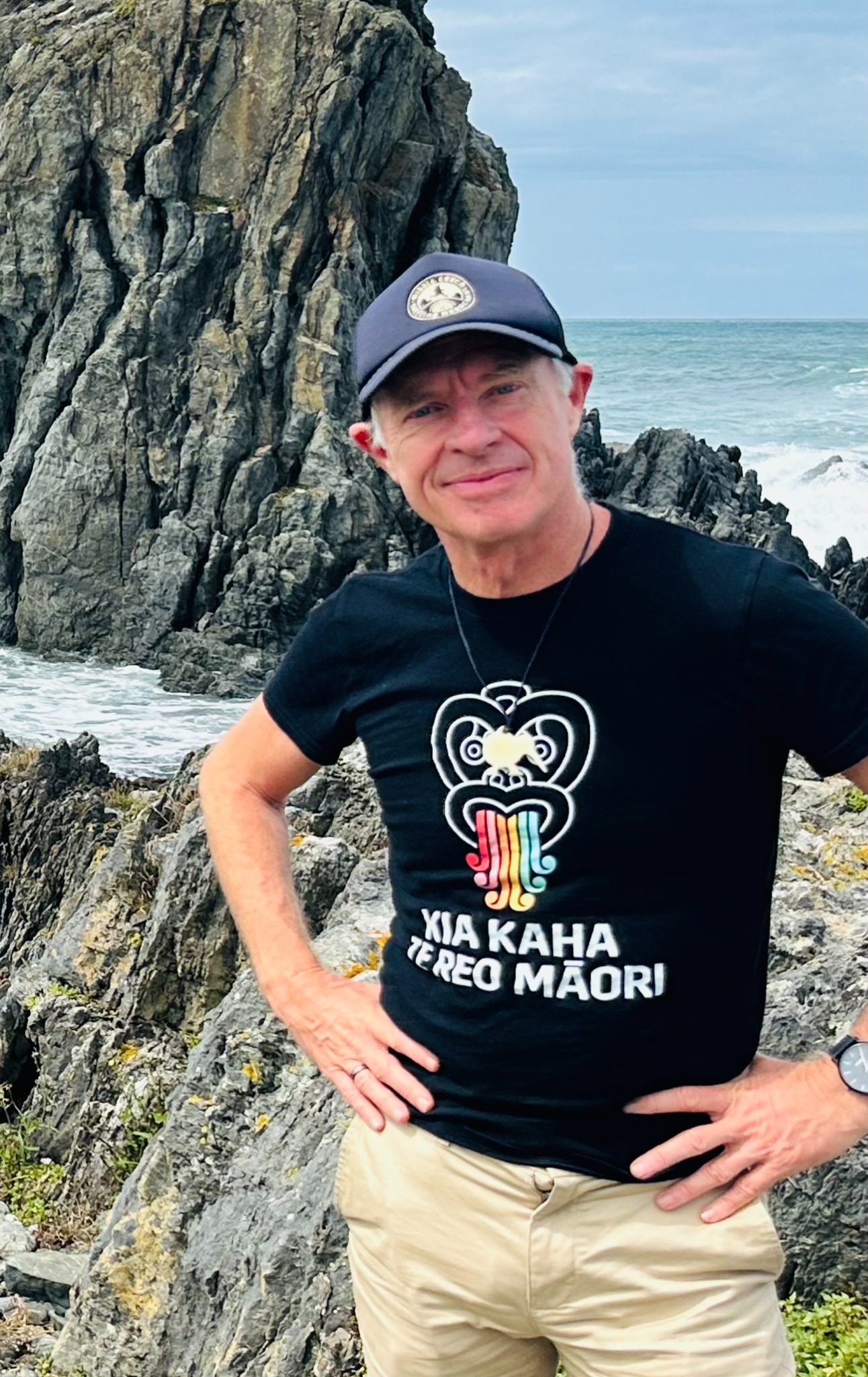 Grant McLean wearing a Te Reo T-shirt in Wellington